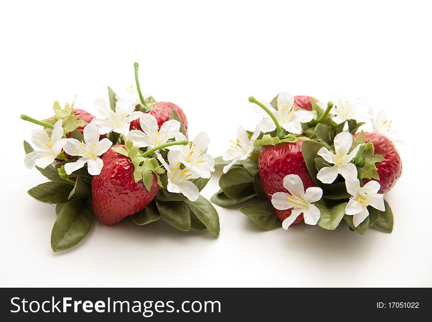 Strawberry plant with strawberries and blossoms