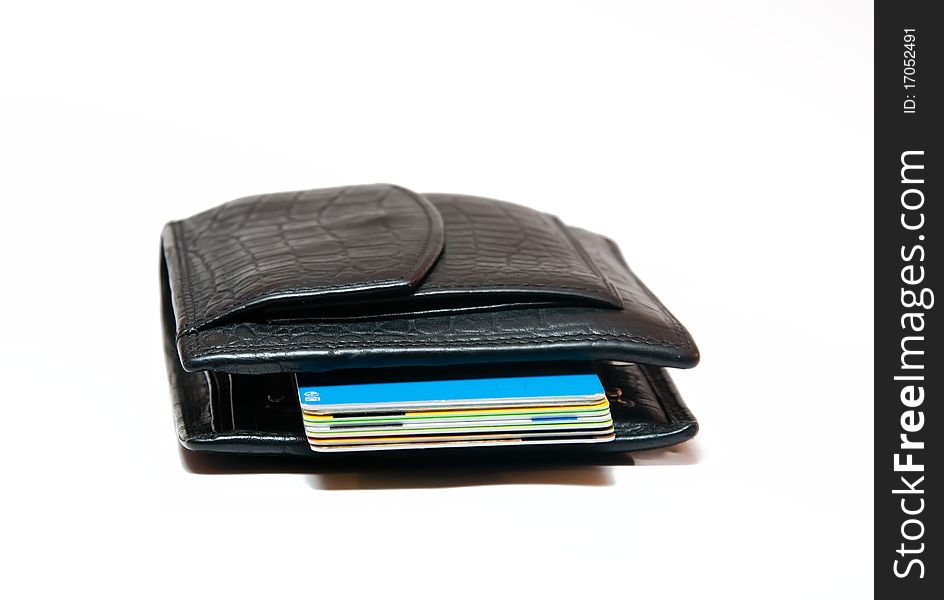 Black purse with credit cards on a white background. Black purse with credit cards on a white background