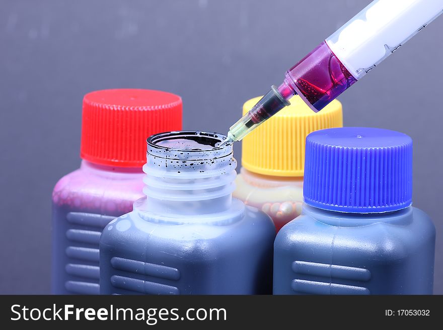 Ink cartridges and syringes andcolored injection,