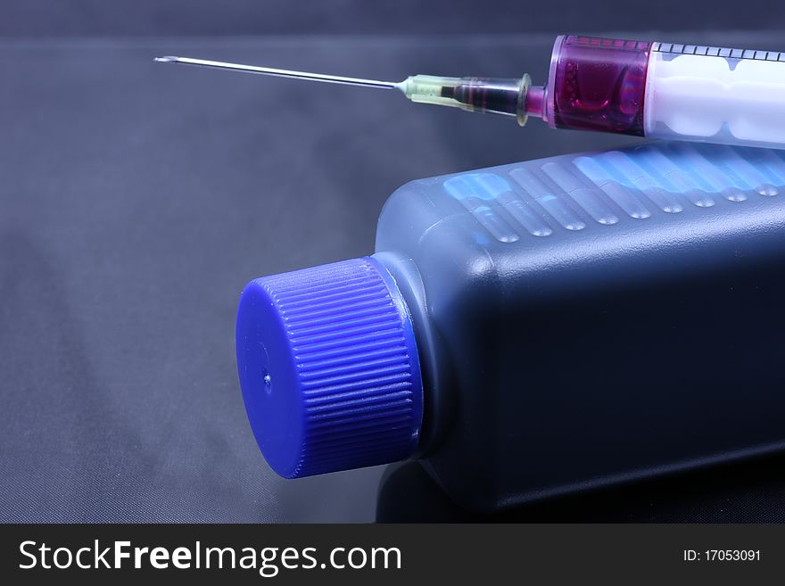 Ink cartridges with syringes and colored injection