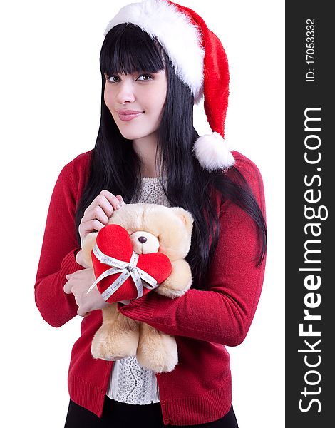 Pretty girl in red hat with teddy bear on white. Pretty girl in red hat with teddy bear on white