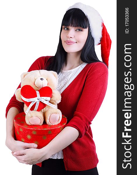 Pretty girl in red hat with teddy bear and box on white. Pretty girl in red hat with teddy bear and box on white