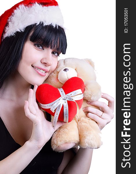 Portrait of pretty girl in red hat with teddy bear on white. Portrait of pretty girl in red hat with teddy bear on white