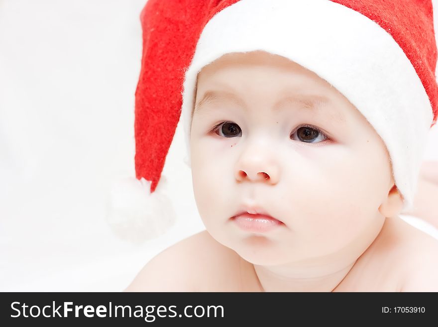 Newborn Baby In Santa Claus Hat