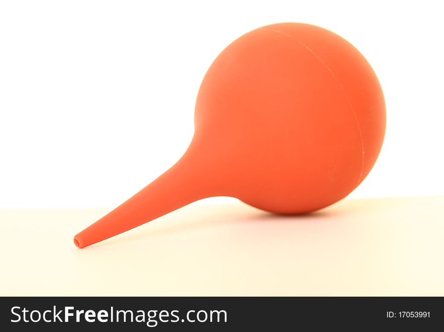 Child's nasal aspirator isolated on a white background. Child's nasal aspirator isolated on a white background