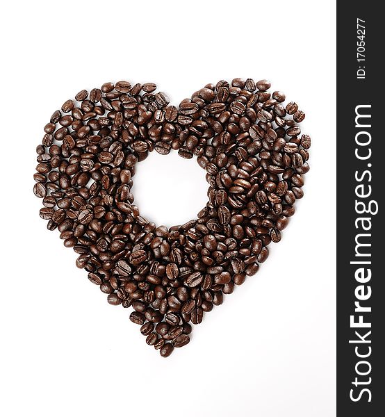 Coffee beans in the heart shape with blank circle in the center