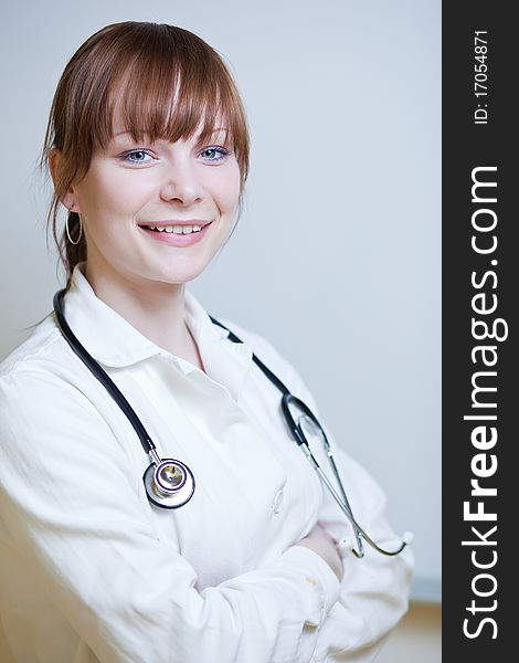 Portrait of a successful young female doctor, looking confident(color toned image)