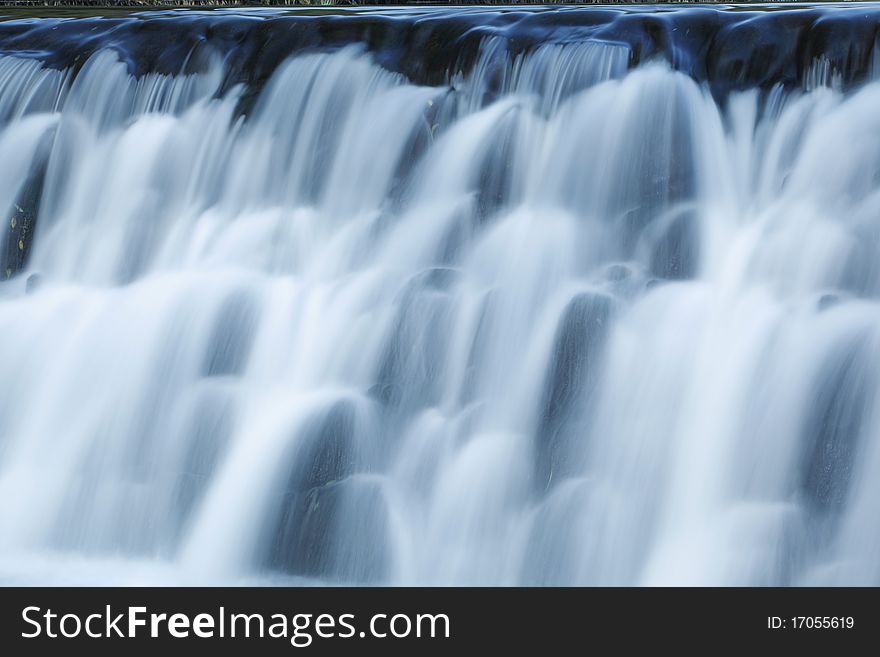 Waterfall On Mountain River