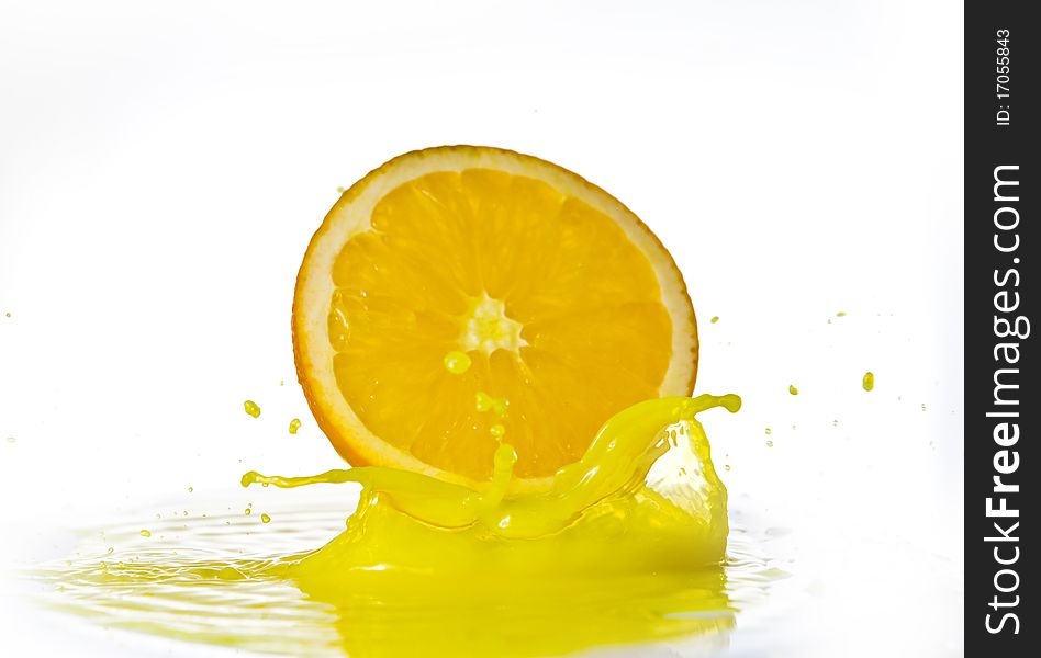 Fruits falling in water on white background