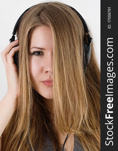 Young Pretty Girl In Headphones