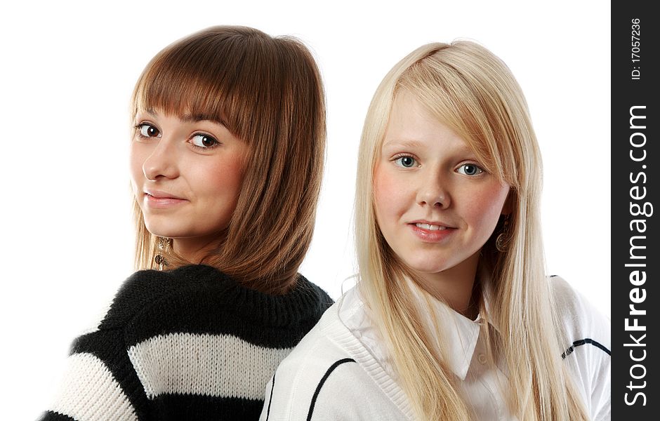 Portrait two beautiful girls in striped cloth on white background. Portrait two beautiful girls in striped cloth on white background