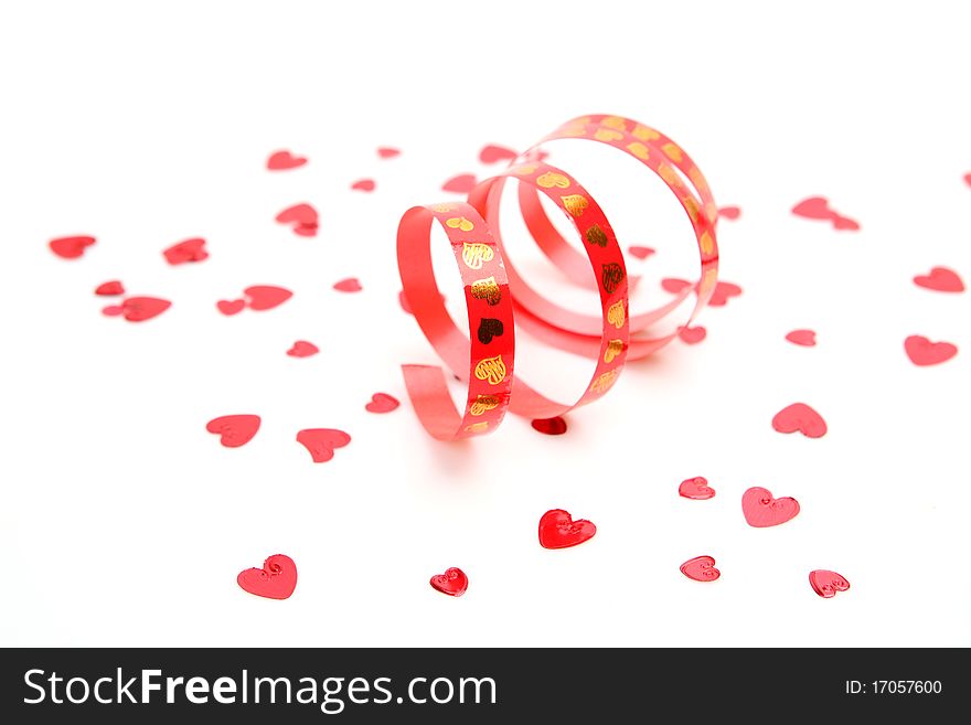 Confetti and streamer on a white background