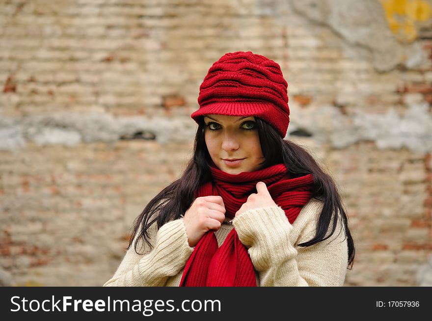 Autumn beauty woman wit red scarf and cap