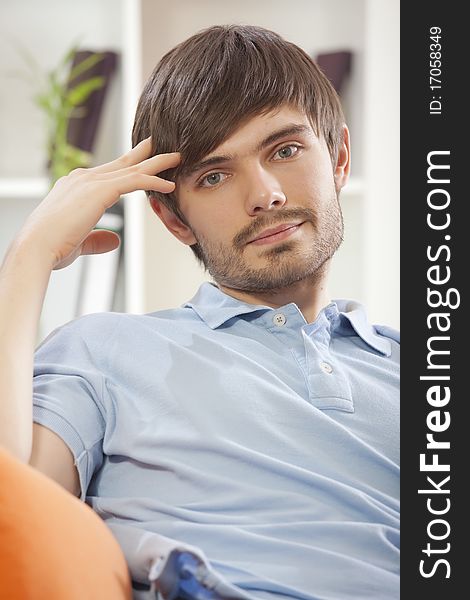 Portrait of relaxed man resting on the sofa. Portrait of relaxed man resting on the sofa