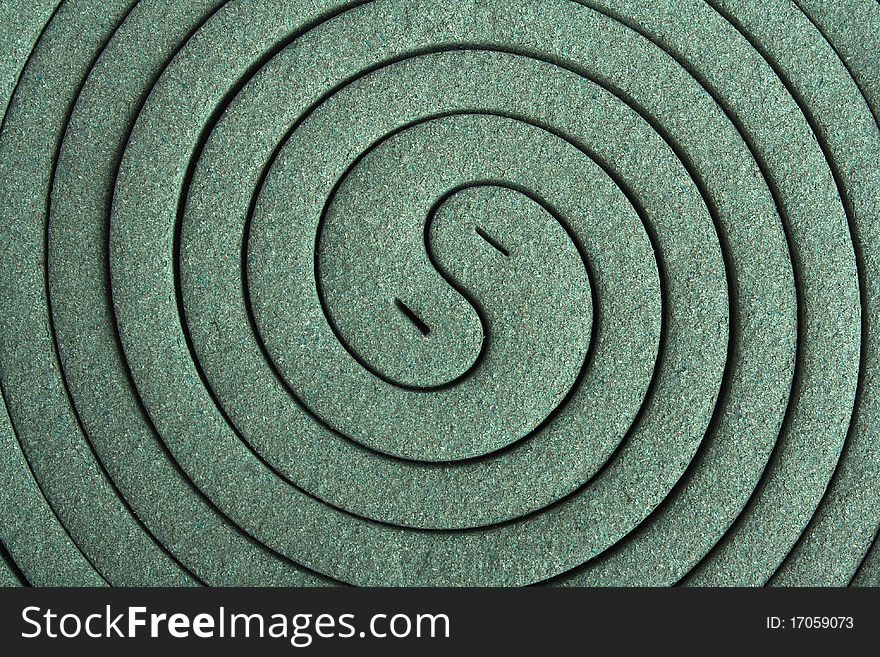 Close up image of classic green mosquito spiral. Close up image of classic green mosquito spiral