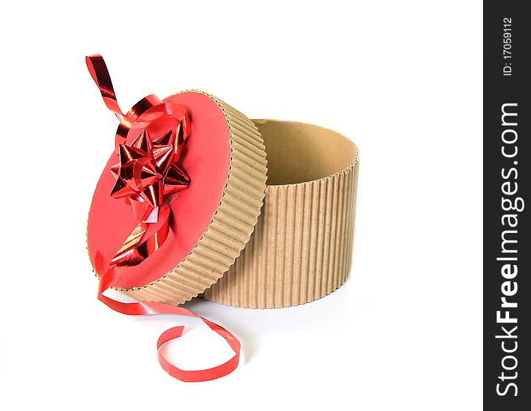 ROund gift with red ribbon, isolated on white background. ROund gift with red ribbon, isolated on white background