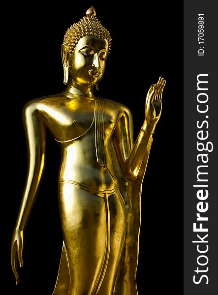 Golden Buddha's statue isolated on black background