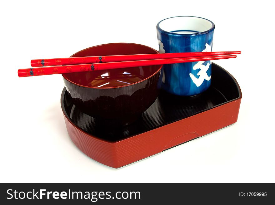 Table set for oriental meal, with chopsticks and rice bowls. Table set for oriental meal, with chopsticks and rice bowls