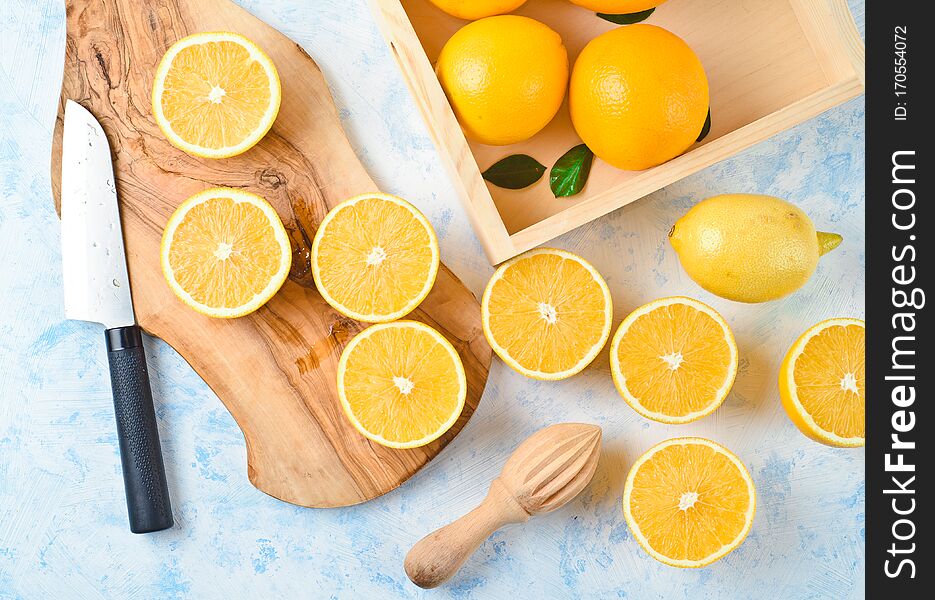 Healthy food, background, halves of oranges sliced for making orange juice