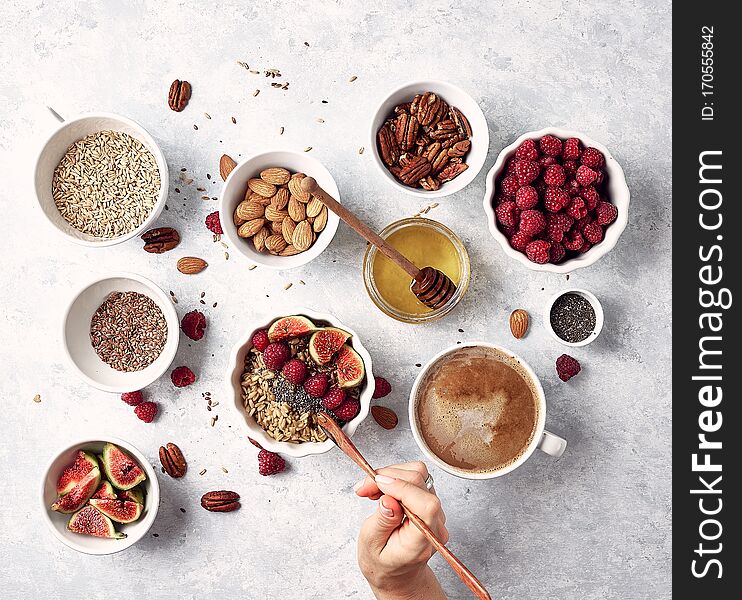 Healthy breakfast oatmeal with raspberries, figs, chia and flax