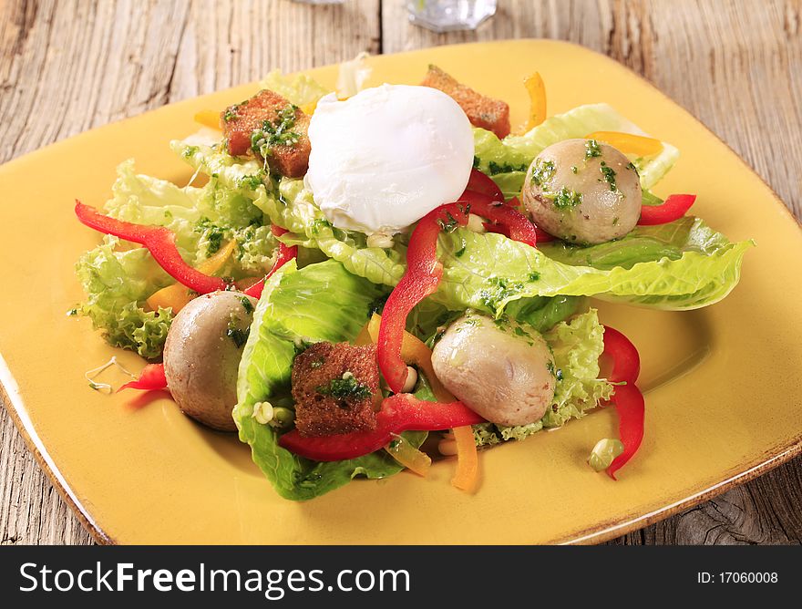 Healthy salad with button mushtooms and poached egg. Healthy salad with button mushtooms and poached egg