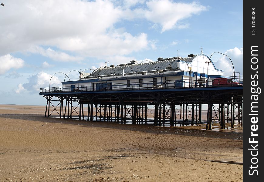 English Pier standind on stilts at low tide