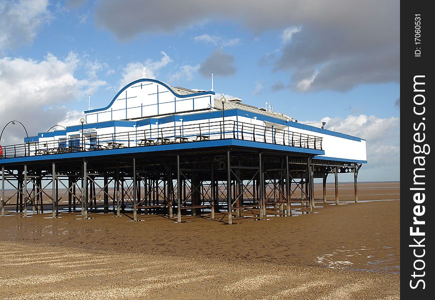 English Pier standind on stilts at low tide