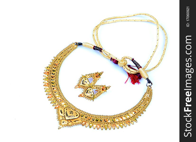 Golden necklace and ear-rings jewellery