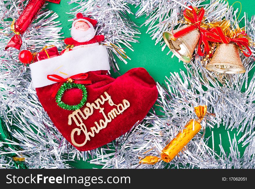 Christmas decoration objects on light green background. Christmas decoration objects on light green background