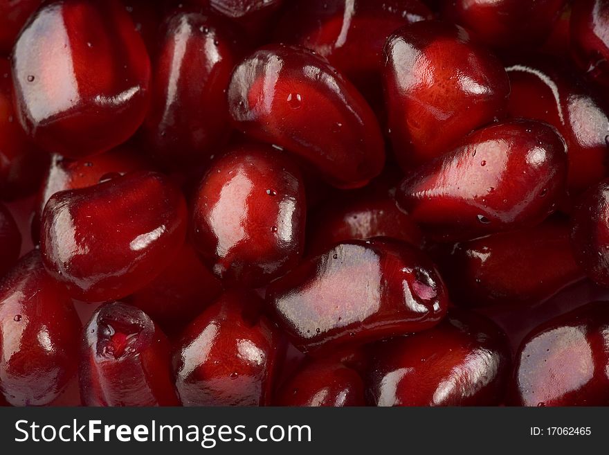 Ripe pomegranate grains close up