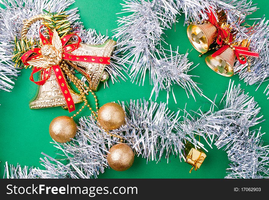 Christmas decoration objects on light green background. Christmas decoration objects on light green background