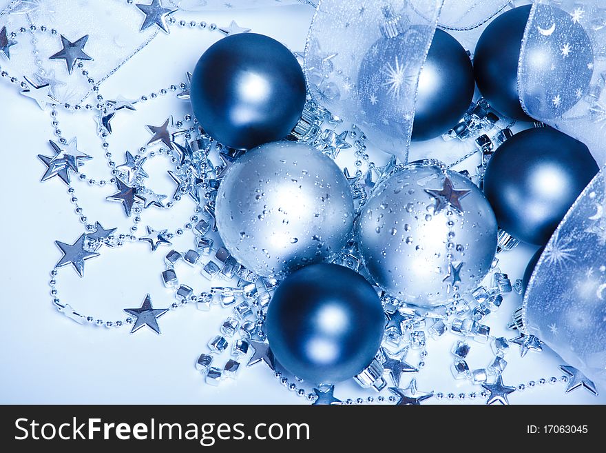 Several Christmas balls shot from top