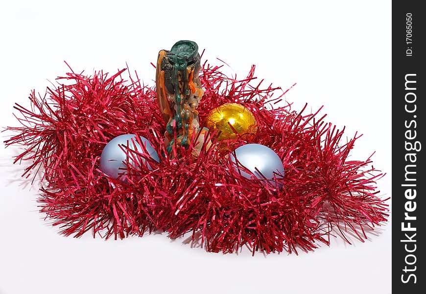 Candlestick with wax and color Christmas balls.Isolated. Candlestick with wax and color Christmas balls.Isolated