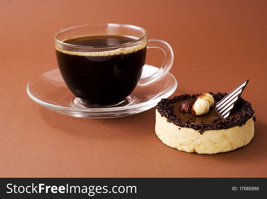 Chocolate tart and cup of coffee