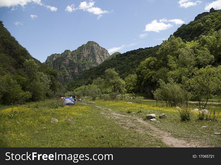 Mountain clouds and tent