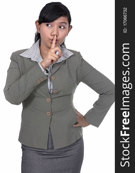 Asian business woman ask to silent over white background. Asian business woman ask to silent over white background