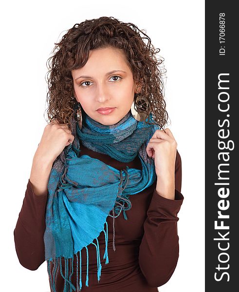 The fine young girl with a blue scarf on a white background. The fine young girl with a blue scarf on a white background