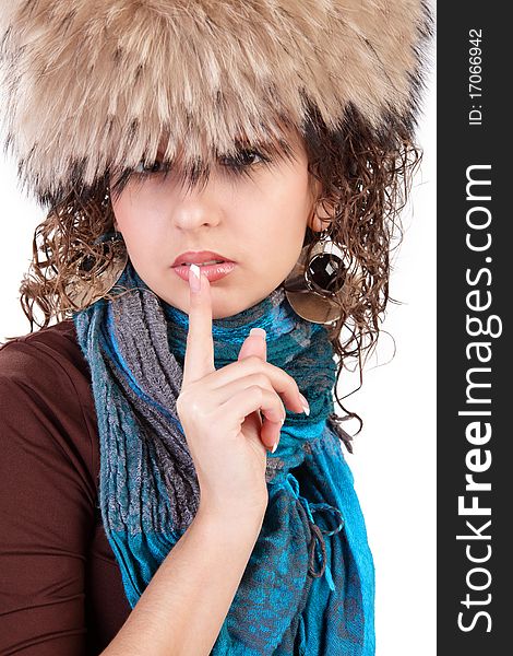 Portrait of the beautiful girl in a fur cap. Portrait of the beautiful girl in a fur cap