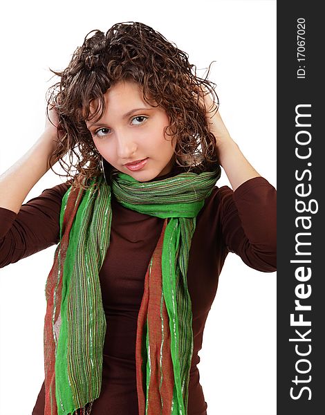 The fine young girl with a green scarf on a white background. The fine young girl with a green scarf on a white background