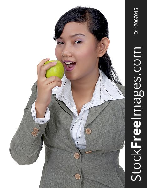 Asian woman eat green apple isolated over white background. Asian woman eat green apple isolated over white background