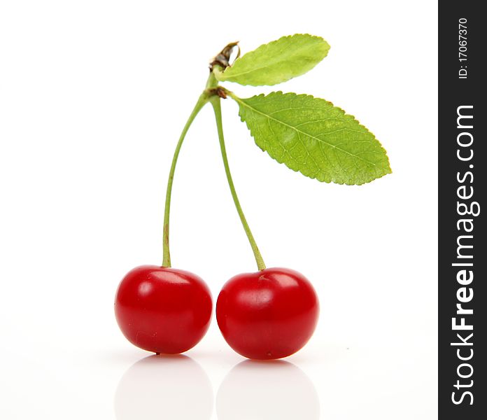 Ripe cherry on a white background