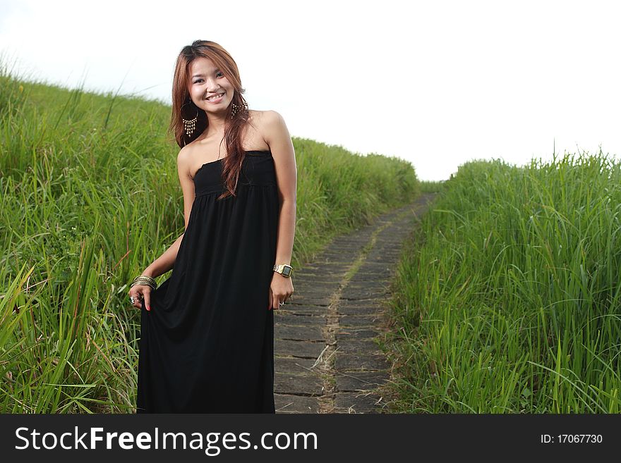 Portrait of the young beautiful smiling woman outdoors. Portrait of the young beautiful smiling woman outdoors