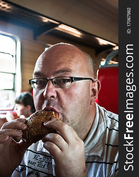 The man eating delicious donut