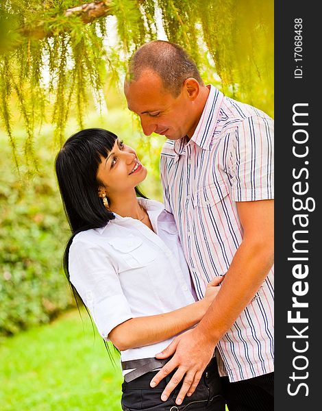 Young lovely couple in the park