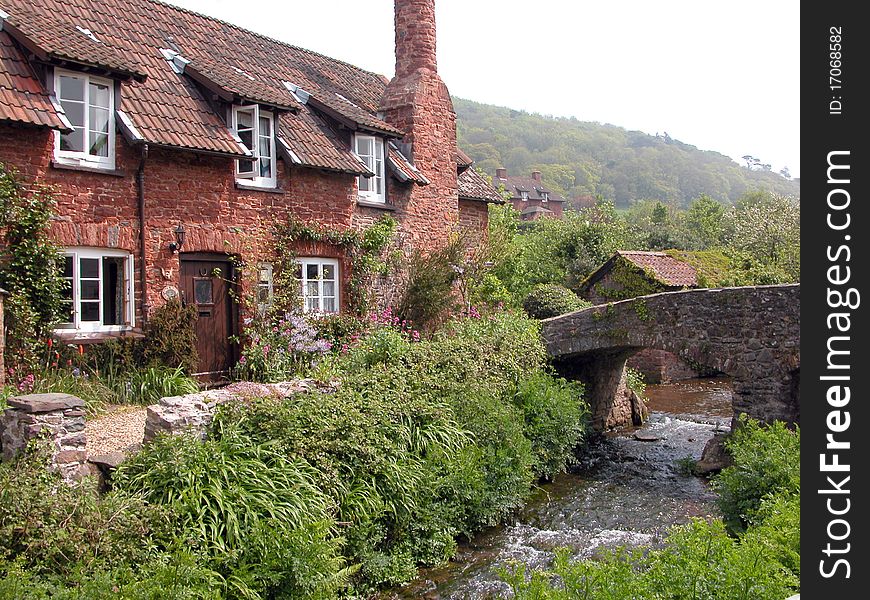 Ancient packhorse bridge in village of Allerford on Exmoor