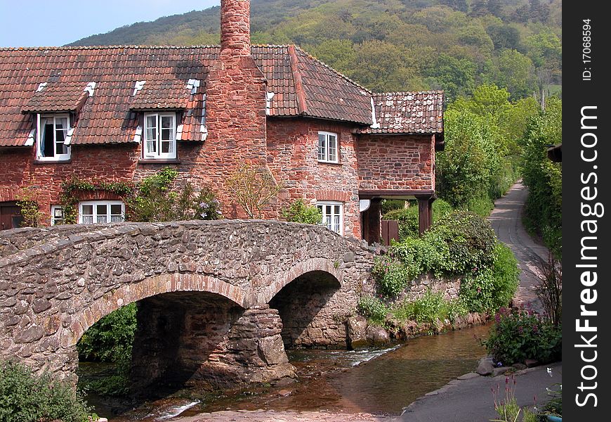 Ancient packhorse bridge in village of Allerford on Exmoor