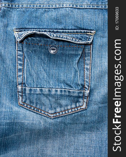 Blue jeans, an open pocket with a button