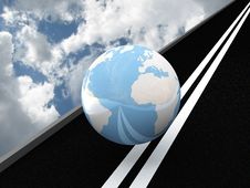 Planet Earth On The Asphalt Against The Sky. 3D Royalty Free Stock Images Planet Earth On The Asphalt Against The Sky. 3D Royalty Free Stock Images