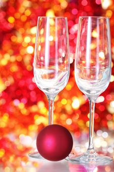 Two Empty Glasses And Red Ball Decoration Stock Image Two Empty Glasses And Red Ball Decoration Stock Image
