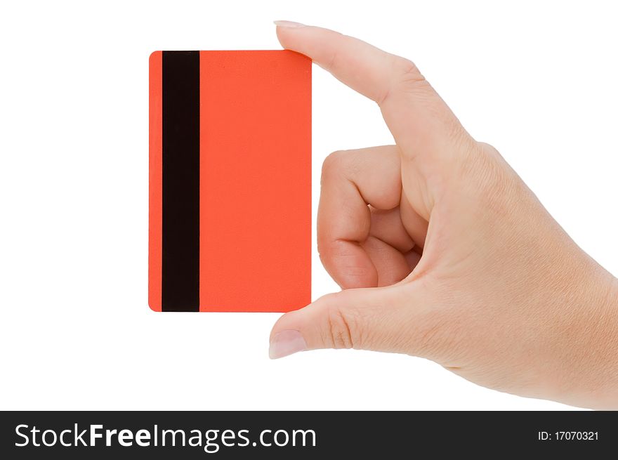 Credit card in a female hand isolated over white